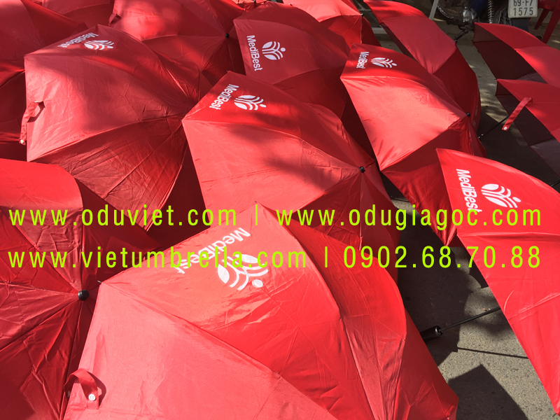 xưởng sản xuất ô dù cầm tay in logo quảng cáo